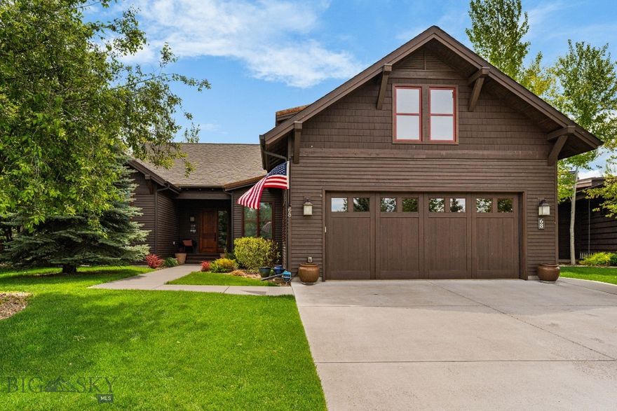 Experience breathtaking views across two fairways, out to the snow-capped Spanish Peaks from this timeless Locati-designed home in the exclusive Black Bull community. Designed for effortless main-level living, the home showcases an open, light-filled layout with classic Montana finishes and exceptional craftsmanship throughout. The great room features a grand stone fireplace and an adjacent wine bar with beverage fridge—perfect for entertaining. From the living or dining areas, step out to the covered redwood deck, where a wood-burning stone fireplace and built-in gas grill create an inviting space to enjoy the expansive golf course and mountain vistas year-round. The chef’s kitchen offers a massive island, walk-in pantry, and upgraded appliances. Each of the three main-level bedrooms includes a private attached bathroom, high ceilings, custom closets and ample space. Upstairs, the spacious 500 sq ft+ bonus room provides flexibility for an office, den, guest space or media room. Additional features include freshly stained cedar siding, wood beam accents, whole house humidifier, water softener with RO system, leaf-filtered gutters, and a heated epoxy-floored garage with extra storage. Set on a quiet cul-de-sac just moments from the Black Bull Club amenities, this residence combines classic design, modern comfort, and unmatched views for the ultimate Montana lifestyle. The Black Bull community offers a championship golf course, pool, fitness center, private restaurant, walking trails, and groomed cross-country ski trails. Please inquire for current club information. Some photos depict club amenities.