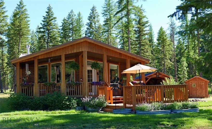 Refined and relaxed in the serene Swan Valley… 3-bed, 2-bath newly manufactured home on 2.34 acres situated for mountain views. Energy Star certified, insulated top to bottom, maintained with care- whether you’re ready to weather 4 seasons or keep as a summer getaway, this versatile home can meet any need. No HOA or zoning means short term rental opportunities too. Many windows and cabinets, Whirlpool appliances, multiple countertops, statement ceiling fan, light fixtures, 2nd showerhead in en suite shower. New deck extends from covered porch; acreage left natural with berm along the property's eastern boundary acts as buffer, minimizing traffic noise and view. Generac, 2nd electric panel, stand-up freezer. 1000gal buried propane tank for fireplace & generator. Crawlspace has moisture barrier & insulated pipes; septic tank monitored by overflow alarm. Enclosed carport and easy access to main road allow confidence for winter travel. A must-see property! If you’ve been waiting for a quality property in the Swan to become available, this modern take on countryside comfort is sure to appeal to you. This 3-bedroom, 2-bathroom newly manufactured home full of extras sits on 2.34 acres perfectly situated for mountain views. Energy Star certified, fully insulated top to bottom, polished design in form, reliable security in function. Whether you’re ready to weather the four seasons or keeping as a getaway, this versatile home can meet any need. No HOA or zoning means short term rental opportunities too. Full of windows allowing an expansive view of the Swan Range, natural light pours in on all sides of this clever layout. Ample cabinets, matching set of Whirlpool appliances, and multiple countertops provide room and ease for mealtime and all your culinary creations. Custom touches throughout such as a statement ceiling fan, dining light fixture, and second shower head in the en suite shower create quiet elegance in the details. Every choice has been made with taste and maintained with care. Outside, the immediate yard is a haven for butterflies and hummingbirds, and a new deck extends from the covered porch to enjoy the fresh mountain breeze, rain or shine.