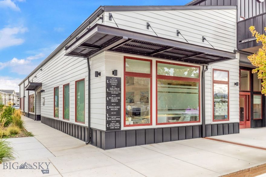 Main Floor Office Space This professional main floor office suite offers a bright, functional layout with an abundance of natural light from expansive windows and 13ft ceilings. Thoughtfully designed for productivity and collaboration, the space includes: a spacious Conference Room equipped with TV for presentations and meetings, a Private Office with wall-mounted TV, open Work Area comfortably situated for three desks. Kitchenette for convenience includes a refrigerator, sink and dishwasher, yes dishwasher. Dedicated Copy/Storage Room to keep operations organized. Additional features include Sonos speakers throughout, forced-air furnace and central A/C for year-round comfort, and the ease of main floor access. Three bathrooms are located just down the hall in this condo building. This office is an excellent opportunity for a team seeking a polished, well-appointed workspace.  One owner is a licensed real estate agent in Montana.