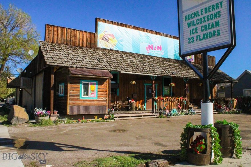 Attention Investors!!!  Here is your opportunity to own a well established, all around strong investment property with a successful Mexican restaurant, ice cream parlor, & multiple rental spaces - close to UM Western and downtown Dillon. Main level (4556+/- sq ft) offers a very popular Mexican restaurant and ice cream parlor along with a newly renovated apartment, plus 2 large additional spaces available for rent or storage. The basement (2700+/- sq ft) houses a 24 hour full gym w/ 2 bathrooms, 2 changing rooms, front counter area & space for a pro shop & even more storage. There are two exits out of the basement for safety. Current tenant has rented this space for over 20 years. With over 7200 total sq ft on a prime corner lot, this building and business has so much to offer. There is parking out front and along the side of the building but also within walking distance from the college & anywhere in downtown Dillon. The current owner has made several improvements to the property. Restaurant updates include a new ventilation system, new grill, refrigerator units, glass counters, added outdoor seating, remodeled the interiors, floors, fixtures, seating areas, tables, chairs, & cabinets. There is a free standing gas stove in the seating area making it cozy in the winter for patrons. Apartment offers a spacious floorplan with 4/5 nonconforming bedrooms, full kitchen, 1 full bath, 1 half bath, stackable laundry, new floors, fixtures and more. There is a separate locked side entry to both the apartment & gym plus front access for the restaurant and a 3rd access/exit on the north side. This locally loved restaurant/ice cream parlor and updated building is turn key and ready for its next owner - most of the heavy lifting has been done for you!!  Call for a showing today!