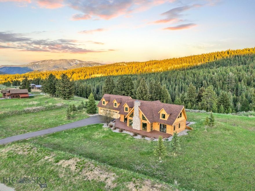 Experience the perfect fusion of rustic charm and contemporary comfort in this spacious, open-concept 4-bedroom, 4-bath home in Big Sky. Ideally located just minutes from Big Sky Town Center and positioned on an expansive 2.5+ acre lot, this property offers unparalleled access to both the vibrant energy of the village and the serenity of nature. Enjoy the lively dining, shopping, and entertainment options just down the road, or step outside and connect directly to an expansive network of trails, with the iconic Ousel Falls just around the corner. In winter, take advantage of world-class skiing at Big Sky Resort, only a short 10-minute drive away—making this home a dream for outdoor enthusiasts year-round. Inside, the home features three distinct living spaces, providing comfort, privacy, and flexibility for guests and families alike. A separate living area above the garage offers an ideal retreat for hosting or extended stays. Throughout the home, rustic finishes blend seamlessly with modern design elements, creating a warm, inviting atmosphere. Whether you're seeking adventure or relaxation, this home offers the best of both worlds—steps from nature’s playground and at the heart of everything Big Sky has to offer.