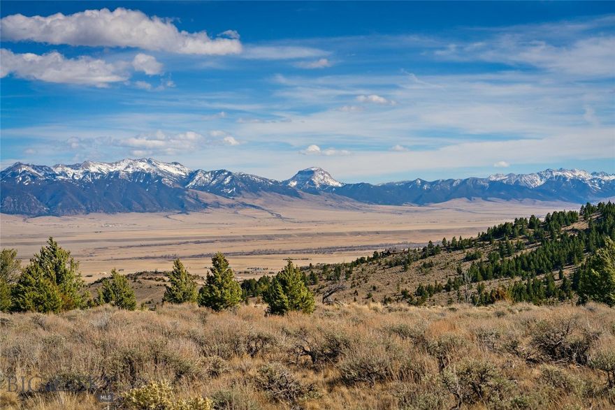 Welcome to 80 North Ridge Road—where a touch of Montana luxury meets laid-back, honky-tonk soul. Set in the Virginia City Ranches just outside of Ennis, this exceptional homesite captures the spirit of the Madison Valley with wide-open skies, rolling hills, magnificent mountain sunrise and sunsets and front-row views of the legendary Madison River.

With year-round access and electricity already in place, you’re well on your way to building anything from a refined mountain retreat to a boots-on-the-porch getaway. Mornings here start with coffee and endless views; evenings wind down with alpenglow, a little country music, and maybe a whiskey under the stars.

Located just minutes from the Madison River and a short drive to the charm of Virginia City, you’ll find yourself perfectly positioned between quiet solitude and classic Western character—where fly rods, dirt roads, and small-town nights still mean something.

If you’re looking for a property that offers both a sense of escape and a hint of high-end Montana living, this one hits all the right notes.