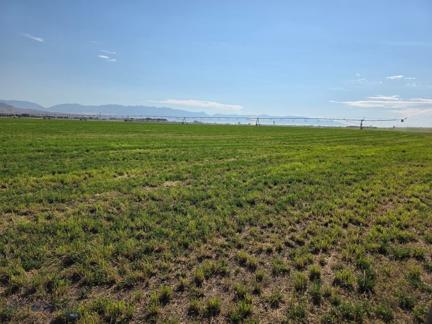 NO COVENANTS OR ZONING! Irrigation water rights, pivot and wheel line all convey. Property currently planted in alfalfa, leased by tenant farmer. Creative Seller - Bring your ideas!! 84+ beautiful acres of farm land just minutes outside of Manhattan. 360 degree views of the mountains and surrounding hillsides. Incredible opportunity for business and commercial use as well with I-90 frontage, and access to exits just a few minutes away. Great mountain views in all directions. *Disclosure: Listing Agent related to Seller.*