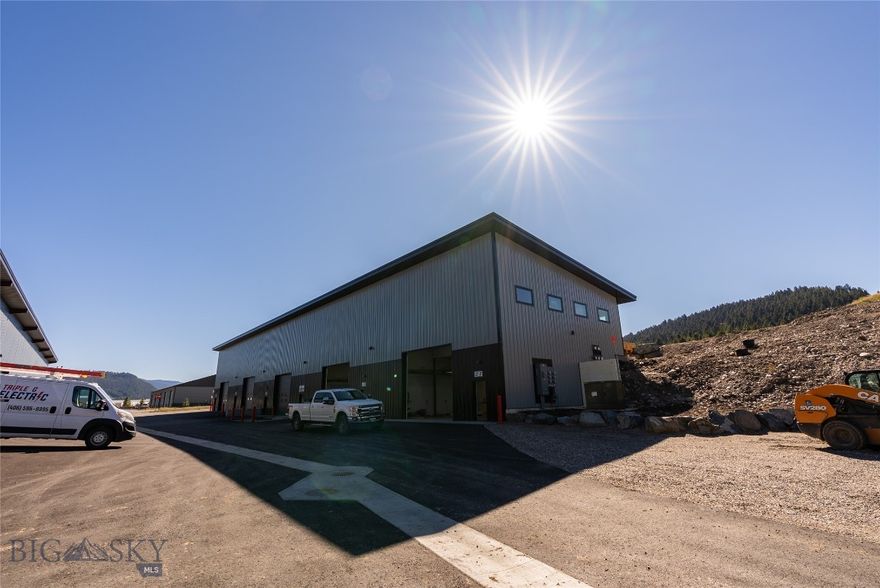 New Big Sky warehouse with a unique layout featuring 1,800 SF on the main level and a 900 SF mezzanine with a separate rear entrance. This layout is ideal for offices above and expansive storage below for safeguarding valuable tools, equipment, and gear from Montana’s harsh elements. The unit includes a private bathroom, heat, a utility sink with hot and cold water, and a 14’ roll-up door. The main level boasts a generous 13’9” ceiling height, maximizing usable space. Whether you're a contractor needing space for offices and supplies or looking to store RVs, vehicles, ATVs, or snowmobiles, this unit delivers. The unit is separately metered for propane and electricity, with convenient access just off Highway 191. Warehouse is under construction with estimated completion date of August.  Note: Some photos are for example purposes and may not depict the actual unit.
