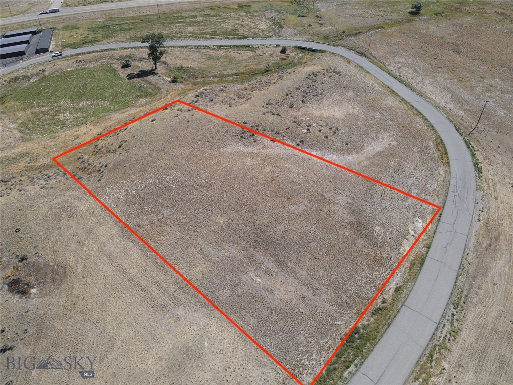 Nestled in the heart of the breathtaking Montana landscape, this 1.77-acre bare land property offers an unparalleled opportunity to build your dream home in the prestigious subdivision of The Village at Elk Ridge. Imagine waking up to 360-degree panoramic mountain views that stretch as far as the eye can see, providing a serene and picturesque backdrop for your everyday life. Located just outside of Three Forks, this prime piece of real estate combines the tranquility of country living with the convenience of nearby amenities. The Village at Elk Ridge is renowned for its stunning natural beauty, featuring rolling hills, lush meadows, and an abundance of wildlife. Whether you’re an outdoor enthusiast or simply seeking a peaceful retreat, this property promises a lifestyle of relaxation and adventure. The subdivision boasts well-maintained paved roads, ensuring easy access year-round. Enjoy community amenities such as a soccer field, baseball diamond, and a charming gazebo perfect for picnics and gatherings. With its close proximity to Bozeman, Helena, and Butte, you’ll have the best of both worlds – a secluded haven with the convenience of city life just a short drive away. Don’t miss this rare opportunity to own a slice of Montana paradise. Embrace the beauty, tranquility, and endless possibilities that await you at The Village at Elk Ridge.