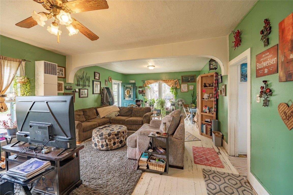 This unique property offers two homes on four spacious lots, providing an exceptional opportunity for investment or multi-generational living. Nestled on Livingston’s east side, both homes are surrounded by mature trees and have ample off street parking. The larger home at 124 South M Street is a charming 2-bedroom, 2-bathroom residence that was upgraded and expanded in 2007, offering modern conveniences with plenty of space. It also includes an attached double garage, providing ample parking and storage. The second home at 126 South M Street is a cozy 2-bedroom, 1-bathroom house, originally built in 1920, brimming with historic character. With thoughtful placement on the property, each home enjoys its own privacy, and the expansive yard enhances the feeling of space. This property has easy access to the hospital river trail, is easily walkable to downtown and only a couple minutes walk to Neptunes brewery.