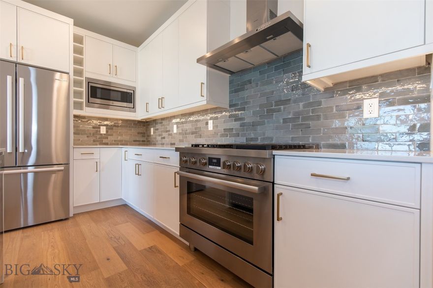 End Unit with Expansive Bridger Mountain Views

Enjoy modern living in this premium end-unit condo ideally located on Bozeman’s vibrant West Side. This home stands out with its large private balcony—perfect for soaking in the sweeping views of the Bridger Mountain Range.

With unbeatable convenience, the unit sits just steps from The Ridge Athletic Club , the new Town & Country Grocery, and all the shops, restaurants, and bars at The Market—making everyday living effortlessly enjoyable.

Inside, Unit 203 features a spacious split floor plan with an open-concept living area and a chef’s kitchen designed for entertaining. Cook and gather around the 6-burner Bosch range, oversized waterfall-edge island, and statement lighting—all while taking in mountain views from the kitchen and living room.

The primary suite offers a walk-in closet and a beautifully appointed ¾ bath, while the second bedroom is privately situated across the living area near a full bath with tub/shower.

Step outside to your generously sized balcony—a true extension of your living space and an ideal spot for morning coffee or evening wine with a view.

The building offers easy access via two staircases and an elevator, and this unit represents an excellent value for both homeowners and investors alike. Please inquire for rental financials on comparable units.

(Furnished photos shown are of a similar unit.)