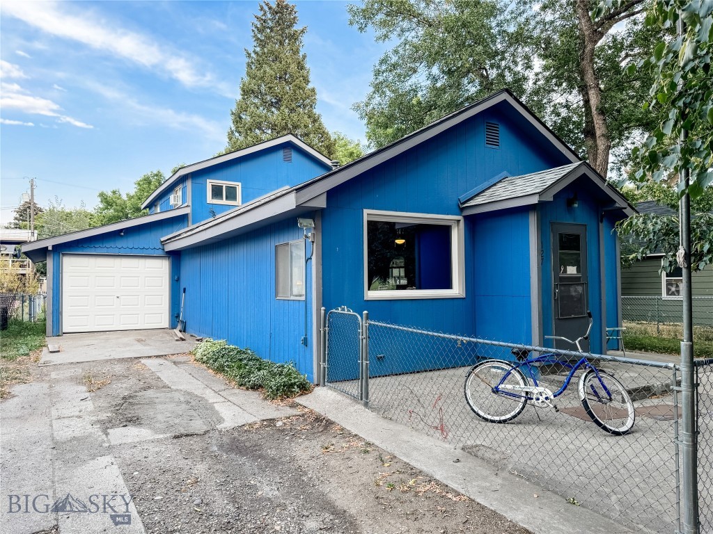 This inviting 3-bedroom, 1-bathroom home room provides 1,687square feet of cozy living space, positioned on a generous 7000 square foot lot on the Southeast Side of Livingston, Montana. Designated as RII this property has great potential for investors, contractors, or developers. Conveniently situated close to the vibrant heart of downtown Livingston, you're just moments away from a wide array of shops and eateries and the famous Blue Ribbon Trout waters of the Yellowstone River. There is a private irrigation well and the back portion of the lot has plenty of room for another residential unit. This home does require some work, making it the perfect fixer-upper project for those with a vision. The prime location and brings incredible potential to this property. Schedule your showing today!