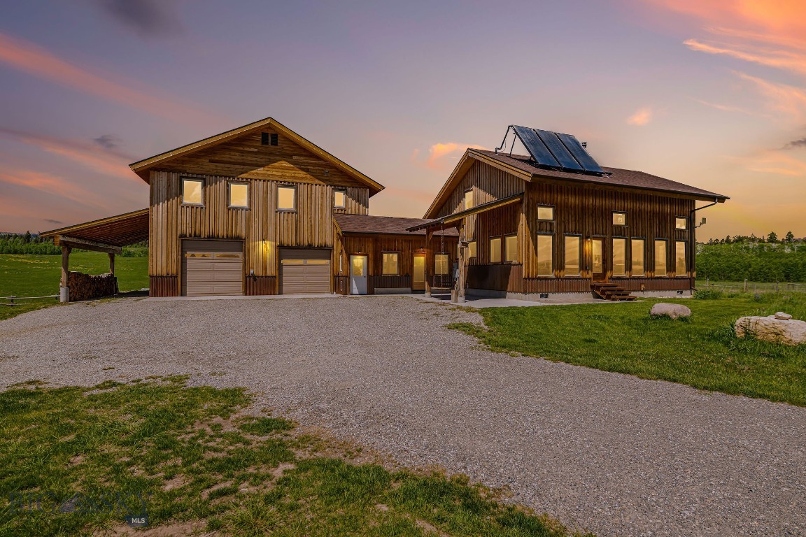 Welcome to 241 Aspen Loop—an architecturally designed custom post-and-beam mountain home just 15 minutes from the West Yellowstone entrance to Yellowstone National Park and just over an hour from world-class skiing at Big Sky Resort. Nestled between Big Sky and Hebgen, 33 minutes to Big Sky school and 9 minutes to Yellowstone holiday boat access. Set on over an acre in the peaceful Aspen Hills Subdivision, this stunning 4-bedroom, 2.5-bath home offers nearly 3,000 square feet of beautifully crafted living space designed for comfort, efficiency, and connection to nature. Built in 2016, the home features passive solar orientation, solar hot water, and heated floors throughout for energy-conscious, year-round living. Enjoy thoughtful details, including a built-in sauna, whole-house air circulation system, and multiple patios and covered porches—ideal for soaking up the mountain air or unwinding after a day of exploration. Whether you're seeking a private retreat, a year-round residence, 241 Aspen Loop delivers the perfect blend of modern design, sustainability, and access to Montana's greatest outdoor destinations. All information deemed reliable but not guaranteed—buyer and buyer’s agent to verify all to their satisfaction. Cannot be nightly rented. Property lines shown in photos are estimations only and not intended to be relied upon—buyer to verify all information.