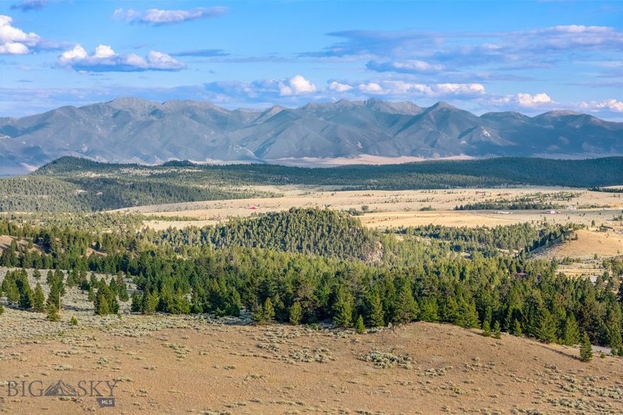 Gorgeous treed property with rock formations and beautiful views of the surrounding mountains, including the Tobacco Roots and Highlands. A perfect place to live out your Montana fantasies and build your dream home. In the heart of Southwest Montana, this property is 18 minutes from Whitehall and 28 minutes from Butte! This property is 6.5 miles from the country's largest contiguous OHV trails. It is a couple of miles from the Continental Divide Trail System for hiking or horseback riding. It is very close to Homestake Lodge, which USA Today labels as the 6th best nordic skiing in the country. It's also minutes away from additional recreational like floating and fishing on the Jefferson River.  Seller is also offering a $5,000 allowance for utilities.