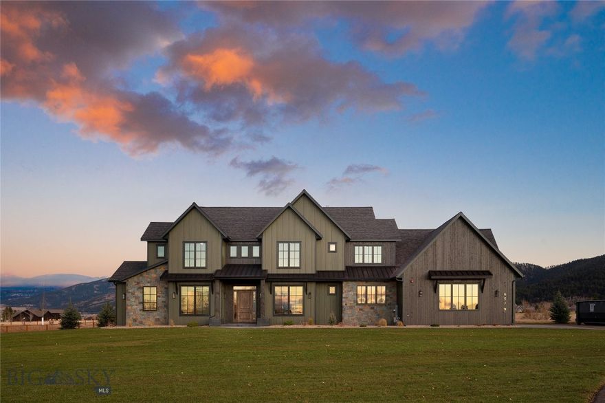 Set against the breathtaking backdrop of SE Bozeman's sweeping mountain vistas, this home embodies the perfect blend of tranquility, modern luxury & thoughtful efficiency. This newly built 5-bedroom, 4.5-bathroom home rests on 1.245 acres, backing to dedicated open space & farmland for unobstructed views of the Gallatin Range & abundant sunlight year-round. Exquisite craftsmanship & refined finishes define the open-concept floor plan, designed for seamless indoor-outdoor living. At its center lies a chef's kitchen appointed with gourmet appliances, a Butler's Pantry, and a large storage pantry—flowing effortlessly into the dining & living areas, where expansive floor-to-ceiling windows frame panoramic mountain views & a gas fireplace adds warmth & ambiance. The primary suite serves as a luxurious private retreat, featuring a copper soaking tub, dual walk-in closets, and a private flex room—ideal for a home office, gym, or cozy den. Two of the four additional bedrooms include ensuite bathrooms, providing comfort & privacy for family & guests, while flexible spaces throughout the home adapt to your lifestyle. Engineered for comfort & efficiency, the home features (2) furnaces, (2) AC units, and five heating & cooling zones, ensuring balanced climate control throughout every season. Dual water heaters provide abundant hot water, while a whole-home water filtration system delivers clean, high-quality water to every tap. A spacious laundry & mudroom connect seamlessly to the heated, finished 3-car garage, complete with a dog door for added convenience. Step outside to the expansive covered patio, designed for year-round entertaining. Equipped with (4) Bromic heaters, this inviting space stays warm & comfortable even on cool Montana evenings—perfect for hosting gatherings, dining al fresco, or simply relaxing beneath Montana's wide-open skies while taking in the ever-changing beauty of the surrounding landscape. Just minutes from downtown Bozeman, Montana State University, and the adventure-rich Hyalite Canyon, this home is ideally positioned for year-round outdoor pursuits. Enjoy fly fishing, hiking, mountain biking, and climbing in summer, or skiing, snowshoeing, and ice climbing in winter—the opportunities for adventure are endless. Blending luxury living, energy-efficient design, and the best of Montana's natural beauty, 657 Hyalite View is more than a home—it's an invitation to live a lifestyle, where MT sophistication meets the spirit of the mountains.