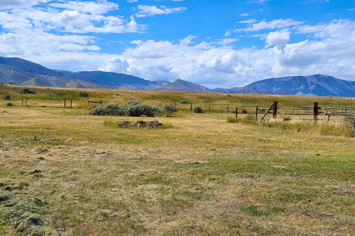 Attention Builders!! Level & nearly a half acre building lot with tons of potential. Both electricity and water (with a frost free hydrant) have been hooked up to the lot, so building your dream is even easier! Great location for a residence, rental, or hunting cabin. Great views of the Lima Peaks and Tendoy Ranges. Call today and come check it out for yourself!