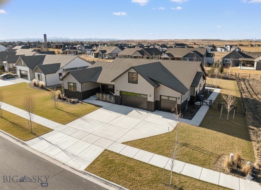 Welcome to Manhattan's beautiful Pioneer Crossing subdivision—a community with tree-lined streets, sidewalks, and parks that offers small-town Montana charm just 20 minutes from Bozeman.
This home stands apart with over $150,000 in mature, professionally installed landscaping that's already established and creating exceptional curb appeal. The outdoor spaces are complete and beautiful from day one—no waiting years for trees to grow or gardens to fill in.
Inside, you'll discover an open living and dining area with vaulted ceilings that flood the space with natural light, complemented by custom built-ins that add both character and functionality. Four bedrooms (one with built-ins that functions beautifully as a home office), three full bathrooms, an oversized upstairs bonus room ideal for a home gym, and a three-car garage provide exceptional space for modern living—whether you're working from home, raising a family, or simply enjoying room to breathe.
The location offers the best of both worlds. You're minutes from trails, fishing access, Manhattan schools, and downtown, with Bozeman just a short drive away. It's an ideal setting: authentic small-town community with mature, move-in-ready landscaping, and convenient access to everything the Gallatin Valley has to offer.
This is a rare opportunity to move into a home where the thoughtful details and hard work have already been done—you simply get to enjoy it.