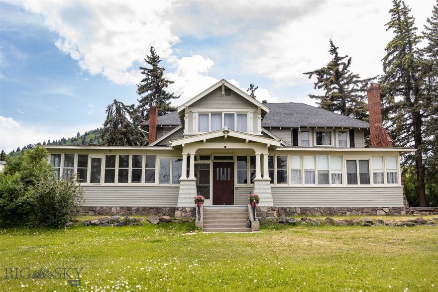 Historic Hansen Mansion was built in 1907 with separate guest cottage constructed in 1915. This home is one of the top ten historic mansions in Butte. The main house has 6 bedrooms and 4 bathrooms, with a ballroom, two kitchens, two large sun porches, and three balconies off of the bedrooms. It is nestled in a private and secluded setting with over 4500 square feet on approx. 1.45 acres. This home features a patio with a fire pit and a deck with a hot tub area. It has an oversized double garage with private driveway and parking. You get a country feel while still in the city of Butte with its private road and no through traffic.  The main house can be separated into 3 rentable units or used as one large home.  The guest cottage is set up as a studio residence with massive rock fireplace and surrounded by rock benches and petrified wood.