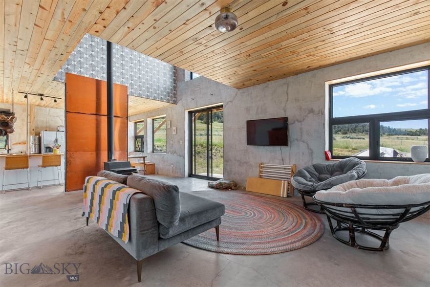 Looking for a spacious rural retreat to accommodate your horses? Look no further than this remarkable 10-acre property offering beautiful mountain views. Situated just a few miles away from a fishing access/boat launch to the Missouri River and granting access to 640 acres of State land, this location is a dream come true. The house has been designed with a focus on passive home principles, utilizing Faswall Natural ICCF Wall Blocks for exterior walls and energy efficient Marvin windows. These all natural composite wall blocks with reinforced concrete provide exceptional insulation, durability, and sustainability. The 2,896 square foot floor plan encompasses one guest bedroom/bathroom on one side of the house with the primary suite located on the other side followed by 2 bedrooms and a full bathroom upstairs. For heating, the house employs a combination of radiant floor heating on the main level and a powerful wood-burning stove centrally located within the home. With the passive home design, the home stays warms without much effort during the cold winter months and cool during the summer. Conveniently located within a 20-minute drive to Three Forks and just 45 minutes to Bozeman International Airport, this property offers both seclusion and accessibility. Don't miss the opportunity to experience it for yourself - call today to schedule a private showing! Click on the virtual tour link to see the Matterport 3D virtual tour of the home.