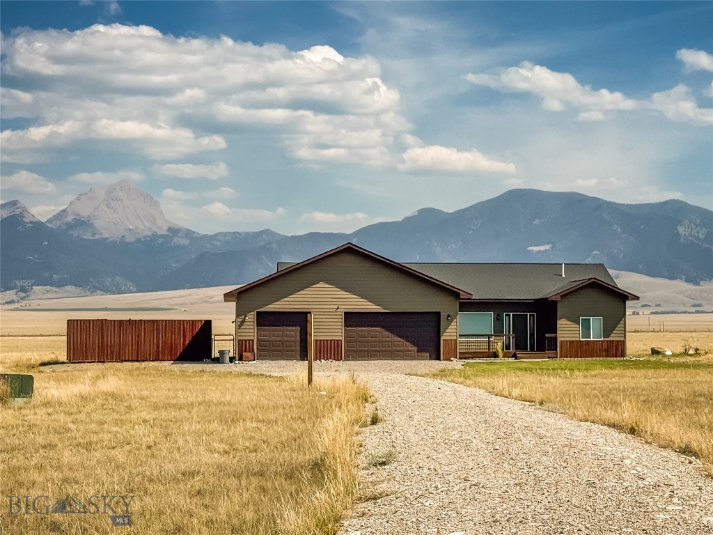 Recreation-rich retreat on 20 acres in the heart of Madison Valley! Lightly lived-in and built in 2020, this 3BR/2BA home feels like new. Enjoy 1800 sq ft of open-concept living with large windows framing mountain views and frequent wildlife sightings. Thoughtful layout includes pantry, laundry, mudroom from attached 2-car garage, and a fenced yard for pets or play. Located minutes from world-class fishing, floating, and hiking, with easy access to Bozeman, Big Sky, and the charm of Ennis. A rare blend of serenity, scenery, and convenience.
