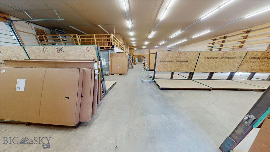 Two warehouse buildings on one lot in convenient location just off Griffin Drive. The South building has approximately 6,900 SF of open warehouse space, with an additional 1,100 feet of office space.  Additionally, there is approximately 1,000 SF of mezzanine space that is not factored into the square footage for extra storage.  High ceilings and three overhead doors make this a very functional warehouse/distribution space.  The north building is 3,400 SF of open warehouse space with one large overhead door.  The buildings are situated at the edges of the lot line to allow ample space in between for trucks, parking, yard space, etc. on the .657 acre lot.