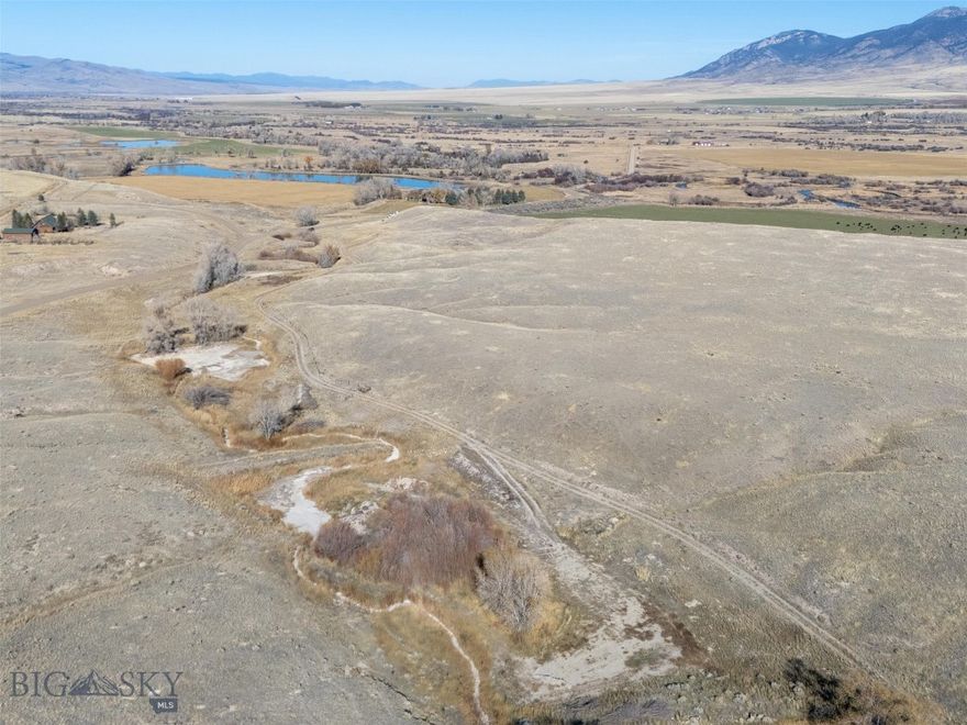 Incredible location for your dream home or recreational getaway! Incredible views with hunting, fishing and outdoor recreational opportunities in every direction! This is the opportunity you've been waiting for to have your dream location in beautiful SW Montana. Just a short distance from Dillon, Twin Bridges and Sheridan, you can enjoy all the amenities you desire while living a country lifestyle where the only sounds are the wildlife and irrigation sprinklers! This parcel is also offered as part of MLS 406766 which includes home, shop and additional acreage with pivot. Don't let this opportunity pass, call today for details!