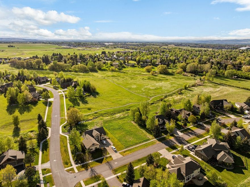 Large south Bozeman residential lot available in Sundance Springs neighborhood! The key to living in Bozeman is having access to parks, mature landscaping, open space, and trails. Sundance Springs is the premier Bozeman subdivision with all of this in mind! City park space and dedicated subdivision open space surround this community. Access miles of trail systems from Triple Tree, Peets Hill, Painted Hills and the Linear trail. Further south takes you to Sourdough, Hyalite and South Cottonwood trailheads. North leads to Montana State University Campus and Historic Downtown Main St. Take a dip in the community pond on hot summer days, and enjoy access to both Bridger Bowl and Big Sky in winter. Come see why residents love this established south Bozeman community.