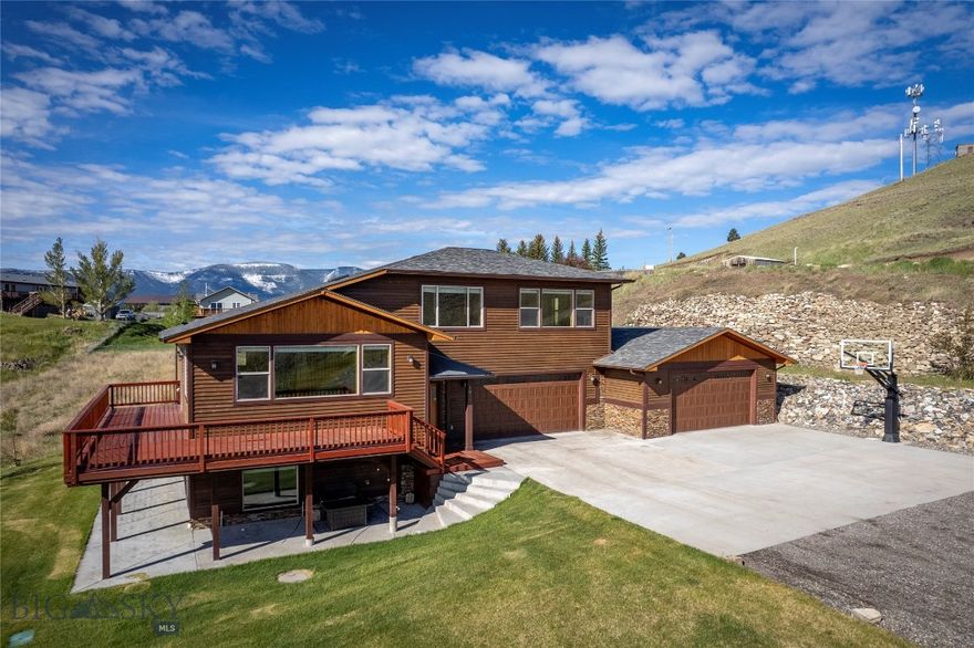 Tucked at the end of a quiet cul-de-sac, this beautifully positioned home offers privacy, expansive views, and the best of the Montana lifestyle. While the setting feels peaceful and secluded, the shops, restaurants, and charm of downtown Livingston are a short drive away.

This thoughtfully situated property captures sweeping views of the rolling Montana landscape stretching out beyond your front door. Wildlife is often seen passing through the area, creating a sense of connection to the surrounding natural beauty.

Set on approximately one acre, the property provides plenty of space to relax and play—whether watching the kids shoot hoops on the MegaSlam adjustable basketball hoop, walking the dogs, or sledding in the winter. Enjoy summer evenings on the deck and take in the dramatic sunsets and expansive views toward the stunning Crazy Mountains.

Designed to maximize natural light and capture the surrounding scenery, the home features an open-concept layout ideal for everyday living and entertaining. A triple-zone heating and cooling system allows for customized comfort throughout the home.

The property includes three spacious bedrooms with oversized windows, two and a half bathrooms, and a flexible ensuite space off the primary bedroom—perfect for a home office, reading nook, or private retreat. The kitchen features sandblasted granite countertops and a well-organized pantry with generous storage.

Two oversized garages provide ample space for vehicles, gear, or workshop use. Outside, an underground sprinkler system services much of the yard, helping maintain a lush lawn throughout the season.