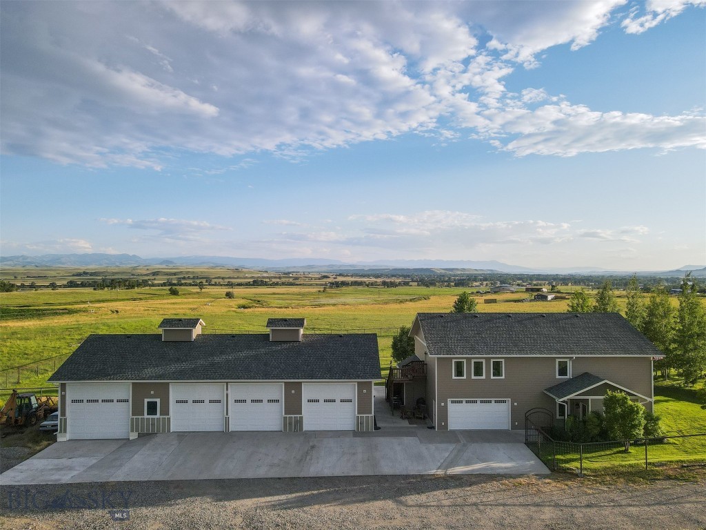 ATTENTION OUTDOOR ENTHUSIASTS!!! This 4br/4ba 3300+ sqft home is ideally located in the country, but just a short drive on paved roads into the lovely town of Big Timber. Nearby recreational opportunities are abound, as this home sits within walking distance from Blue-Ribbon fishing via an improved fishing access and boat ramp on the famous Yellowstone River, and close to all the outdoor activities to be enjoyed in the surrounding Crazy, Absaroka, and Beartooth Mountains. Enjoy the peace and quiet, sunrises and sunsets, wildlife, and 360° views from almost anywhere in this home; whether it be a deck, a patio, or the attractive large windows. This home has soaring ceilings looking up to the second floor, a kitchen most dream about complete with upgraded appliances and tons of counter space, a sun/sitting room and an expansive mud/laundry room - just to name a few of the astonishing touches in this home. Outside is a large landscaped area with mature trees and underground sprinklers, and an exceedingly large shop!! This home truly has so many perks and details you don’t want to miss! Call today to set up a showing!