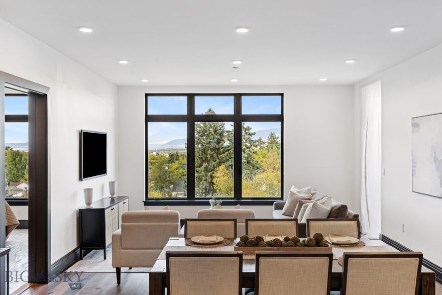 Light and bright, this South East facing unit in The Henry, a six-story luxury condominium building in Downtown Bozeman, #408 has a bright and airy feel to it. Sitting on over 1,439 SF with two bedrooms, and two bathrooms, and a 96+- sf heated balcony, this unit has it all. With engineered oak hardwood floors, wool carpeting, quartz countertops and Bosch appliances to go with high-end fixtures and tons of natural light, this condo is a ready-made luxury offering in the heart of the Rocky Mountains’ coolest town. And it doesn’t stop there - The Henry building has amenities that make it more than just a residence: a ground floor fitness center, a private, landscaped courtyard and climate-controlled, secure underground parking. Just three blocks from Main Street, twenty-five minutes to Bridger Bowl and forty-five minutes to Big Sky Resort, you'll have easy access to the vibrant downtown scene, outdoor recreational activities, and Montana's stunning natural landscapes