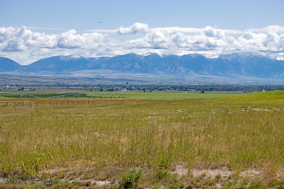 Nestled at the end of a quiet cul-de-sac on the outskirts of Manhattan, this 1.526-acre lot offers the perfect blend of privacy, views, and Montana charm. Enjoy panoramic vistas and a peaceful rural setting with two adjacent 20-acre parcels preserving your space and sightlines. Whether you're dreaming of building your forever home or a serene retreat, this lot delivers the ideal canvas. A well has already been drilled, making your future build even more convenient. With expansive Big Sky views and a tranquil backdrop, this is Montana living at its finest.