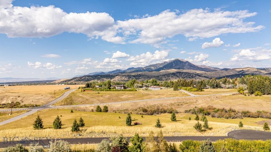 A Rare South Bozeman Lot with Unmatched Views & Ideal Setting | Discover a serene acre-plus homesite in South Bozeman that perfectly balances convenience and natural beauty. With a level building envelope, coveted southern exposure, and sweeping Bridger Mountain views, this property offers the perfect canvas for your dream residence. Located just 5 minutes from downtown Main Street and within easy reach of Bozeman Deaconess Hospital, Montana State University, and an extensive network of scenic trails, it provides seamless access to year-round recreation, cultural amenities, and everyday essentials. Enhancing its appeal, the sale can include architect-designed house plans, allowing you to step confidently into the building process with a thoughtfully envisioned design already in hand. This added value accelerates your path to construction while still leaving room for your personal touch. Nestled among a few intimate yet spacious parcels and dedicated open space, the lot offers both privacy and a strong sense of community. Whether you imagine mornings spent soaking in mountain vistas or afternoons adventuring in the outdoors, this property delivers a lifestyle where Montana’s wild beauty and Bozeman’s urban conveniences meet in harmony.