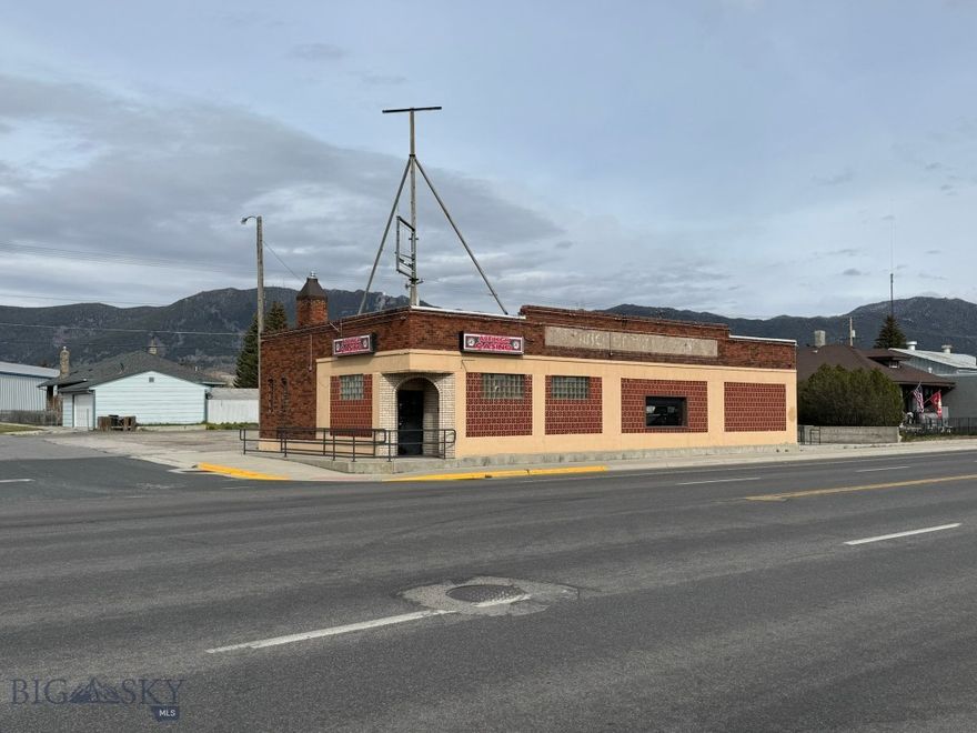 A commercial building located on Butte's primary commercial street featuring a large parking lot—a rare offering on Harrison Avenue. The mostly open interior layout provides flexibility for a wide range of uses. The property also includes a newer roof and updated electrical, plumbing, and heating systems.