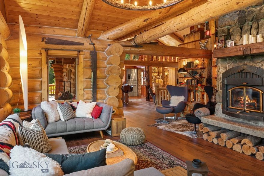 Welcome to the Cozy Alpine Chalet, a passionately handcrafted log home and legacy retreat, thoughtfully positioned on nearly 7 pristine private acres of alpine forest. Just 11 miles from both Bozeman and Livingston, and only 25 miles from Bozeman Yellowstone International Airport, the property offers effortless access to Montana’s finest dining, shopping, and outdoor adventure—yet feels like your own secluded mountain top forest escape, worlds away from it all. The main home has been extensively renovated between 2022 and 2025 with over $1 million in thoughtful upgrades including a full rebuild of mechanical systems, a smart home setup, professional interior styling, and high-end finishes throughout. Artisan log construction, natural wood and stone interiors, and over 30 Andersen windows bring in forest and mountain views from nearly every room, while six fireplaces create cozy gathering spaces indoors and out. This mountain retreat includes a chef’s kitchen with a full KitchenAid stainless steel suite, two laundry areas, and rich character in every detail. Tucked further into the trees, the Honeymoon Treehouse Villa is a newly built architectural jewel, elevated 15 feet above the forest floor. Built to Passive House / High-Performance standards, it features quadruple-pane glazing, premium insulation, and a future cantilevered hot tub deck, all framed by a soaring roofline designed for both elegance and energy efficiency. With all utilities installed and the interior ready for your finishing touch, this secondary structure offers limitless potential: a luxury rental, a serene guesthouse, or your personal creative retreat. This is a truly turn-key offering, with all furnishings, curated décor, bedding, chef’s cookware, and antiques included. Smart home features like Yale Wi-Fi locks, remote lighting and climate control, iPad/voice automation, and Starlink satellite internet ensure convenience and connectivity, even in this private setting. Whether you dream of taking over a luxury short term rental business (currently commanding up to $1300/night in the high season), creating a soulful family compound, or stewarding a rare legacy property for future generations…The Cozy Alpine Chalet awaits. With unmatched craftsmanship, immersive natural beauty, and an incredible location at the gateway to America’s first national park, this is truly Montana living at its finest.