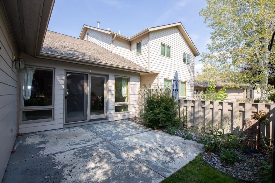 Enjoy easy access, low maintenance living, and a location that puts you minutes from trails, shopping, dining and everything Bozeman has to offer!   This spacious and inviting, 3br/2ba, end-unit condo, tucked away in the heart of Bozeman is up for grabs!  This 1900+sqft condo sits among mature trees, and features a private back patio - perfect for relaxing.  Step inside to an open, light-filled layout with a cozy gas fireplace, a handy mud room, and an attached 2 car garage.   The generous sized master suite is a true retreat with a walk-in shower, large soaker tub, and plenty of space to unwind.  With a welcoming community feel, and a prime location, you'll love calling this home!!!