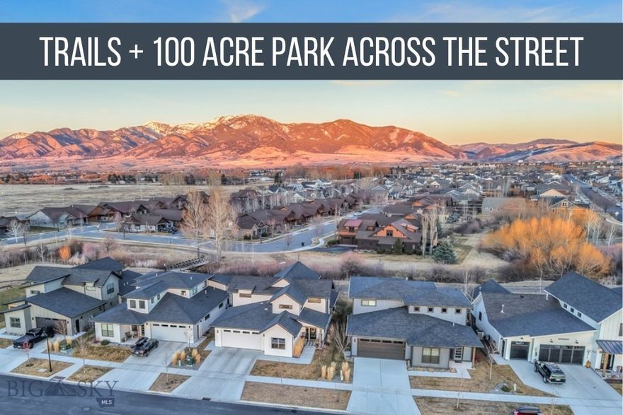 Park-side living in The Crossing, with trails out back and Gallatin Regional Park directly across the street. This thoughtfully designed Old Mill Homes residence offers ~2,800 sq ft, 4 bedrooms, 3 full baths, 3 car garage and a layout that lives beautifully: vaulted ceilings, upgraded windows, and an easy open flow between the kitchen, dining, and living spaces.

The kitchen anchors the home with quartz countertops, abundant cabinetry with under/over cabinet lighting, and a generous walk-in pantry with built-ins. The main-level primary suite is positioned for privacy and open-space connection, with direct patio access for seamless indoor-outdoor living. Upstairs you’ll find two additional bedrooms, a full bath, and a spacious loft that works as a second living area, office, or media space, finished with a striking custom metal railing.

A 3-car garage, central A/C, and excellent storage complete the package in a prime Bozeman location where park time and trail time are part of everyday life.