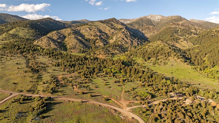 This property sits at the base of the Bridger Mountains and is only 25 minutes from Bozeman and the Bozeman airport. The property offers great build sites, live water, power, and magnificent views. There is new road infrastructure to the property as well. Recreational opportunities are endless with National Forest access nearby as well as fishing on the East Gallatin and other major rivers that flow through the Gallatin Valley. The property is approximately 45 mins from Bridger Bowl and 1.5 hours to Big Sky for all of ones skiing needs.

Springhill 40 is an exceptionally rare offering in one of the most coveted and historic areas in the Gallatin Valley. Almost impossibly secluded and located in the shadow of Ross Peak, this property is in a vibrant and varied wildlife corridor near the Springhill community. Tom Reese Creek and Evan Reese Creek turn into Reese Creek, flowing through the property for about a third of a mile. Just 25± minutes north of Bozeman, this 40± acre private escape is the epitome of scenic beauty. The acreage is comprised of lush wetlands and groves of aspens with exquisite views of the south face of the Bridger Mountains and Gallatin Valley.