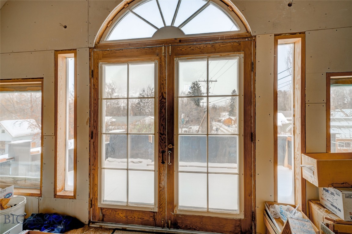 Located in the Heart of Downtown Bozeman, this remodeled and enlarged home presents an amazing opportunity for the new owner to finish & customize to create their dream property!! Designated as a single family dwelling it could be easily converted to a duplex... it's your call! The current owners have started the process and added creative & unique details that mimic the charm of its 1900's origin. Incredible vaulted ceilings, windows-light galore, 3 gas fireplaces, reclaimed wood flooring, archways, curves... second story balconies. Roughed in with 2 Bd/ 2 Ba. Walk to your favorite destinations & activities in our beautiful thriving city. A spacious covered car port provides ample off street parking. Invest in something totally different!! Reach out for a showing today!
**Property being sold unfinished & "as is".  Entire structure is framed in but needs both interior & exterior finishes completed. New Electrical/plumbing/HVAC on the main level of original structure and the new addition. Electrical on the 2nd story of addition requires completion. A list of included construction materials is provided in supplements.