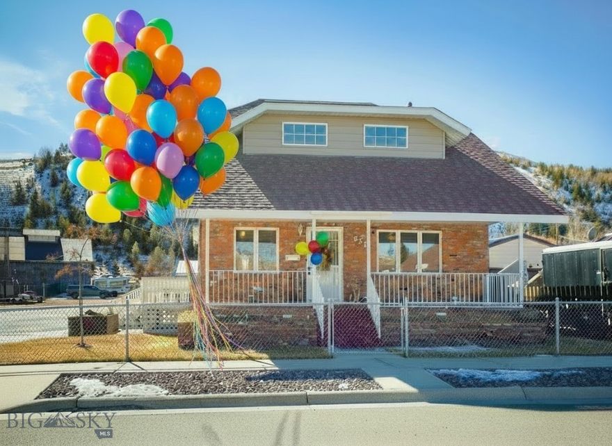 Welcome home! This stunning property on a nearly 10,000 square foot lot in the heart of historic Anaconda has endless possibilities for a gracious primary residence with guest house and extensive garages and workshop, or a second home with income property, or so many other options. Two homes, six garage spaces, workshop with bathroom, enormous carport, and multiple storage sheds. Wow! The main home beckons you inside with a welcoming sunroom where there are cozy corners to relax and unwind. The kitchen/dining/living room layout is perfect whether entertaining or enjoying being at home. The bathroom and laundry are located on this level. Downstairs is a second family room with a gas stove, perfect for a game room and extra sleeping space. The mechanical room and storage rooms are here, too. Upstairs there are three bedrooms and bathroom, all tastefully appointed. The home has recent vacation rental history with five-star reviews. Furnishings are available. Next door at 608 Washington, a separate guest house is in superb condition. The one-bedroom home has a fenced yard, and it works very well for rental income or extra guest space. For those who love to tinker, the garage space is incredible. 610 Washington has a four-car garage, a large room and bathroom and another garage space and workshop with a wood-burning stove. 1248 square feet under one roof. A completely separate single car garage has a concrete floor and pit. The enormous carport measures 18' x 45'. Two separate storage buildings and RV parking round out this amazing property. Check out the video tour and book your private showing.