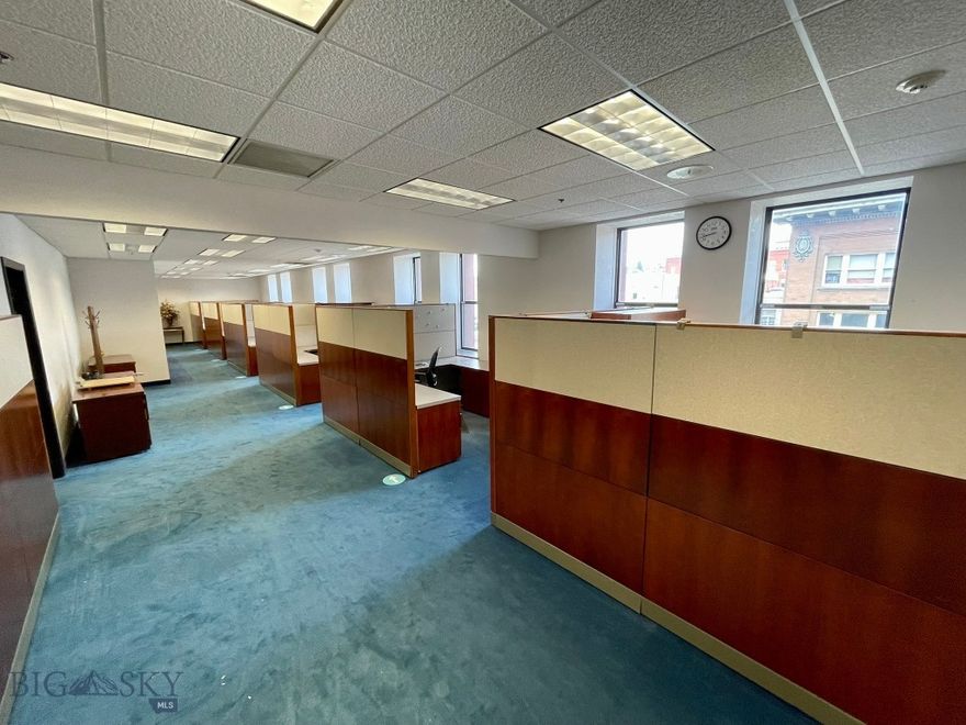 Located in one of Uptown Butte’s most historic and distinguished landmarks, the 3rd floor unit in the Hennessy Building offers just over 2,800 square feet of beautifully designed, move-in-ready office space.
Conveniently accessible by elevator, this suite is fully furnished for all your office needs — providing desks, chairs, and functional layouts that make it easy to start operating from day one. Expansive windows on multiple sides create a bright, open atmosphere and allow for flexible configuration options to suit a range of professional uses.
This space includes Cat 5 and Fiber Optic wiring for high-speed connectivity, secure building access and keyed entry covered parking, utilities and janitorial services included for added convenience and friendly management dedicated to helping businesses thrive.
Whether you’re establishing a professional office, creative studio, or boutique service space, this suite offers the perfect blend of historic character and modern efficiency. It’s an exceptional opportunity to join a vibrant and growing business community in the heart of Uptown Butte.

The Hennessy Building — where history and opportunity meet
