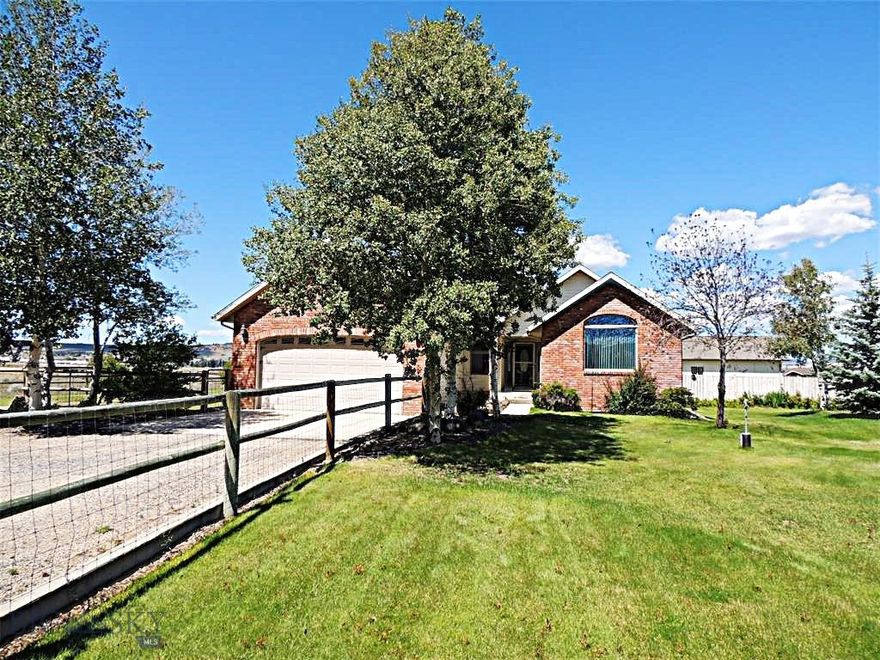 ONE OF A KIND PROPERTY ON 2,5 ACRES. This custom home offers many conveniences and extras you can only experience by scheduling a showing. You will find an eloquent master bath with a jetted tub, a steam shower and a walkin closet. A large family room with a beautiful fireplace and a bar to entertain or to gather with family and friends. The kitchen is large enough to have a dance with your honey while you are cooking. The cozy living room with vaulted ceilings provides ample space for the family to watch a movie or to visit. For the creative person there is a shop with a 220 V outlet and a workbench and wood stove to keep you toasty. Did I mention the Greenhouse....for the person with a GreenThumb to start planting early and get red tomatoes....even in Butte. The beautiful yard with all its trees also has a large Raspberry Patch for you to make jam or to just create delicious desserts. The 2.5 acres can be used in many ways to play in or to have some animals as the property is fenced. What are you waiting for.....call today to make an appointment.