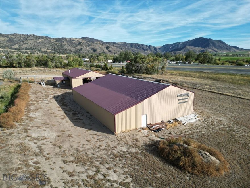 This is a rare opportunity to own a commercial property featuring I-90 frontage at a prime intersection between Bozeman, Butte, Helena, and Ennis. A fantastic investment for anyone looking to secure a centrally located, high-visibility space with easy interstate access.

The property spans 3.68 acres +/- and includes two large buildings with a total shop space of 7,200 sq. ft —perfect for a variety of business uses. The current operation as a sawmill proves the industrial capacity of the site. Whether you’re interested in manufacturing, semi-truck repairs, food production, or even starting a distillery, the potential here is boundless. 

Private road access and no zoning restrictions give you the freedom to develop this space to meet your exact needs, and seller financing is available for non traditional financing arrangements.

Property Features:

Building 1: 40’x70’ with an office attached
Building 2: 55’x80’
3 Phases Electric 
Room to expand with additional buildings, including multi-story options

Equipment on property is negotiable:


Logosol PH360 4-Head Planer Molder

24” SuperMax Super Brush

Baker 26” × 12” Planer

Baker Blue Streak Band Saw (30HP Electric)

Baker Edger

Wall-Attached Work Bench

Wood Stove

4 × 8 Work Bench

AV-54 Auto Knife Grinder with Stand/Bench

(2) Wood Carts

(2) Roller Stands (8’ Long)

Banding Machine

All Dust Collection Extractors (except CNC machine unit)

All Wood Inventory Remaining at Time of Purchase

Resaw Table

Don’t miss this chance to invest in a property with high-traffic I-90 frontage with no zoning restrictions.
Schedule a tour today!