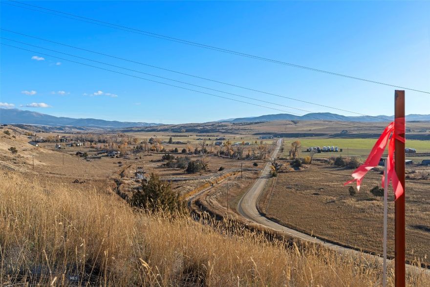 Some places just speak to you — and this 2.01-acre parcel in Deep Creek Estates is one of them. Tucked into a peaceful corner of Montana with sweeping mountain views in every direction, this lot is ready for your next chapter. The land is open, buildable, and full of potential, whether you’re planning a forever home, a weekend cabin, or just want space to stretch out and breathe. Power is nearby, and the setting? Picture-perfect. Just a short drive to Townsend and close to outdoor adventures, this property blends freedom with possibility. If you’ve been waiting for the right land at the right time, this one might just be it. Come see it for yourself — the views are even better in person.