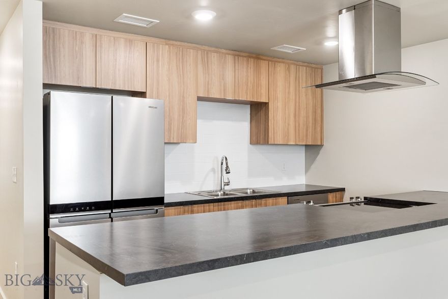 Experience modern living in historic Uptown Butte at Rudolph Condos, Butte's newest condominium development. This 1-bedroom, 1-bathroom condo features an open floor plan and exposed brick. The stylish kitchen boasts stainless steel appliances, while the spacious living area is perfect for entertaining. Located in the heart of Uptown Butte, you’ll enjoy easy access to dining, shopping, and local attractions. Don’t miss this rare opportunity to own a contemporary condo in a vibrant, historic setting!