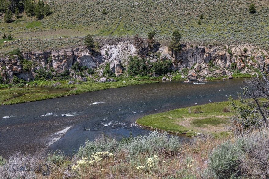 Lot 2-B has magnificent Madison River + mountain views + excellent fishing from this premier 10-acre lot, near the "Big Bend" on the river.  Build your dream home on the bench with magnificent views of the rock cliffs on the opposite shore, across a wide stretch of river.  Access the river by a trail down to a common area with exclusive use of 1 mile of shoreline - no public access from land.  Easy, year-around access from US Hwy 287, through a private locked gate, via a gravel road, down to a perfect building site, with up-and-down river views, as well as views of the Madison and Gravelly Mountain Ranges.  There is power available along the lot line with Lot 2-A.  Well on adjoining lot to the north is 180' deep with 20 GPM.  Well at the house to the south, on 3-B, is 93' deep with 30 GPM!  There is fiber optic cable available along the highway.  Close proximity to Yellowstone National Park, surrounding National Forest lands, Hebgen Reservoir, Earthquake Lake, Henry's Lake, and Cliff & Wade Lakes.  Ennis "Big Sky Airport," servicing private aircraft, is 30 minutes' drive north, and West Yellowstone's airport, approx. 30 minutes' drive to the east, has multiple daily commercial flights during the summer.  Wildlife visitors abound on the property.  Must see to truly appreciate the possibilities.  This is a gentle stretch of the Madison River, a much-coveted area to fish and soak up the views.  Best lot!  Best water!  POSSIBLE OWNER FINANCING!