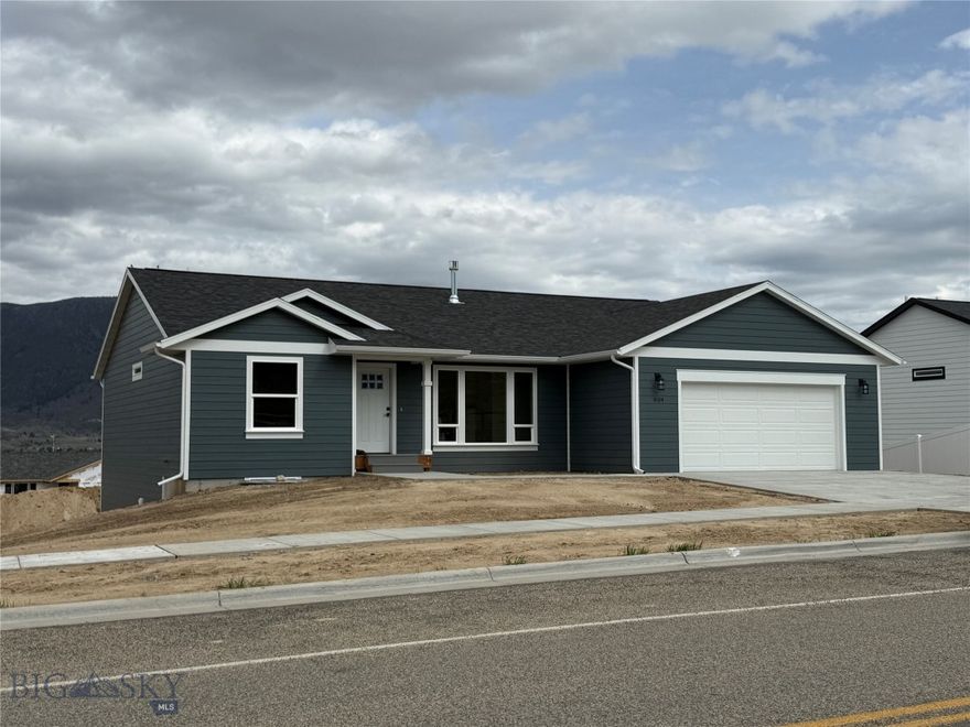 Stunning New Home in Copper Fox Subdivision Discover your dream home in the highly sought-after Copper Fox subdivision, offering breathtaking views of East Ridge and Timber Butte. This to-be-built home combines modern comfort with timeless elegance, featuring three spacious bedrooms and two stylish bathrooms. Enjoy the flexibility of an unfinished walkout basement — perfect for a home gym, entertainment area, or additional living space tailored to your needs. The home includes an attached garage and a deck off the kitchen, ideal for entertaining or simply relaxing while soaking in the scenic views. A sliding door from the basement leads to a patio, creating multiple outdoor spaces to enjoy.  Don’t miss the chance to secure a prime location with panoramic views of the entire subdivision.