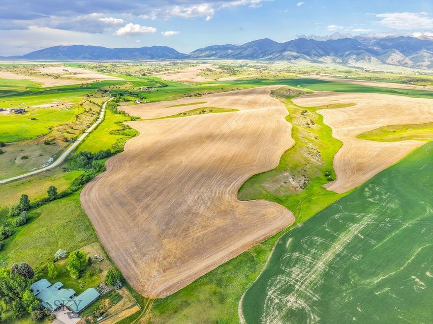 This 126± acre property in northern Belgrade presents a rare opportunity to create your ideal Montana retreat. Set against a backdrop of expansive valley views and distant mountain ranges, the land offers a gorgeous elevated homesite with a perfect blend of open space and natural beauty. With easy access to Belgrade, Bozeman, Manhattan, and the airport, the location feels private yet conveniently connected. The parcel is unzoned, allowing for a wide range of uses—from residential or agricultural to recreational—and offers ample room for horses, livestock, or future improvements. A truly special setting with endless potential.