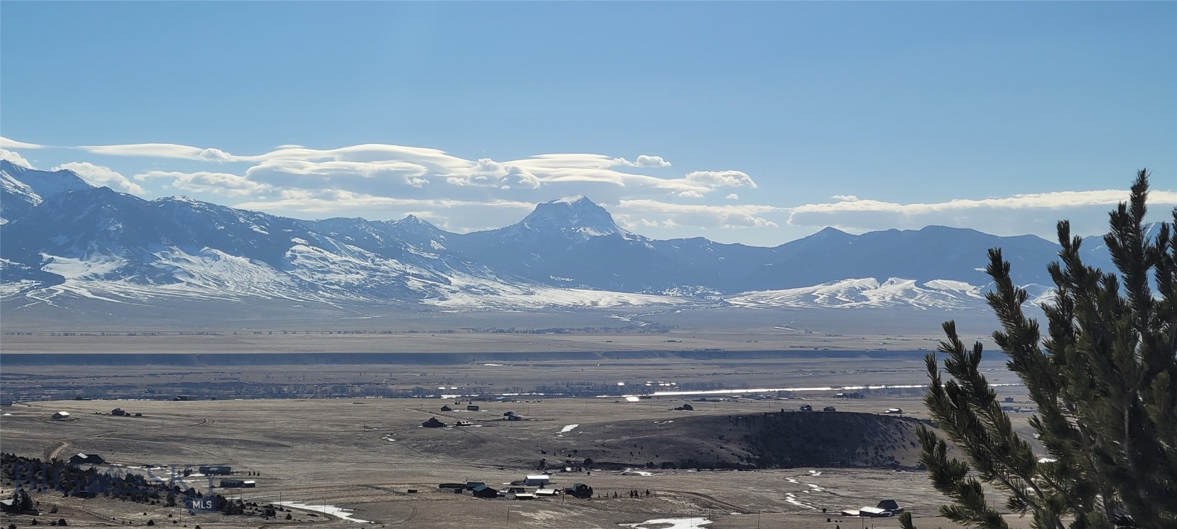 Awaken each morning breathtaking views of the Madison Range, Sphinx Mountain, the Madison River and Valley, with the serene Ennis Lake visible in the distance. This exceptional 13.324-acre parcel is ready for your dream Montana home, featuring both a well and electrical service already in place.
Property owners enjoy exclusive access to privately stocked trout lakes, as well as direct access to adjacent Forest Service and BLM lands—ideal for horseback riding, hiking, fishing, hunting, and biking. The property is conveniently located less than 20 minutes from Ennis and approximately 70 miles from Bozeman, offering premier shopping, fine dining, and a highly rated airport.
This is a wonderful homesite in one of Montana’s most scenic and recreationally rich regions.