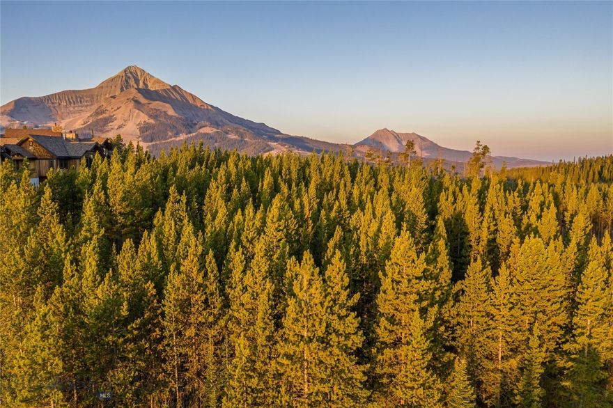 Discover the ultimate mountain lifestyle with this exceptional ski-in/ski-out homesite in Big Sky's prestigious Cascade neighborhood. Offering stunning panoramic views of the surrounding peaks, this prime lot is perfectly positioned for your dream mountain home, surrounded by mature trees that provide privacy and a natural setting among this energized mountain town. Enjoy immediate access to world-class skiing at Big Sky Resort, take a short drive to explore the scenic and sought after Beehive Basin Trailhead, or cast a line in the renowned trout waters of the Gallatin or Madison Rivers. Whether it's skiing, hiking, or fishing, this property places you in the heart of Montana's finest outdoor experiences, all just minutes from your doorstep. Don’t miss the opportunity to build your ideal mountain retreat in one of Big Sky’s most desirable locations.