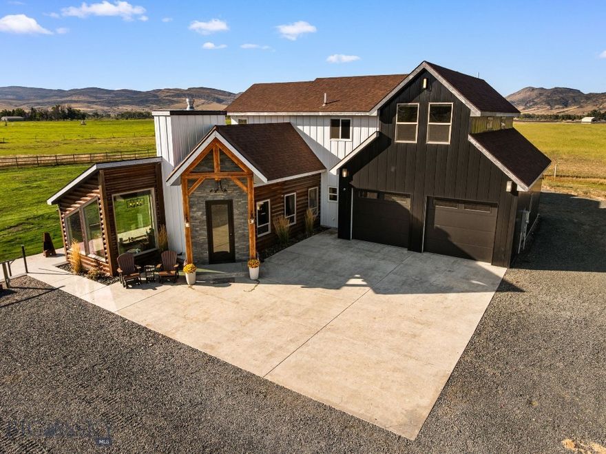 This beautiful Willow Creek end of the road property offers over 3,000 square feet of living space on two acres with an oversized heated garage, providing ample room to enjoy the outdoors without covenants. The home features a distinctive modern-farmhouse design with hand-carved beams as well as locally made maple cabinetry. Inside, you'll find a central vacuum system, radiant heat, abundant lighting with ample storage, a luxurious master suite, and a cozy family room with window box seating plus storage.

The property also boasts a large garden with a shed, taking advantage of the area's milder Montana winters and longer growing season. A versatile sunroom/office, complete with a wet bar and mini-fridge, opens onto a nearly 1,000 square foot stamped concrete patio, offering breathtaking views of the Tobacco Root Mountain Range's sunsets. In the evenings, you can enjoy generous exterior lighting or turn them off to experience the serene, starry nights.

This home provides a peaceful haven from the stresses of everyday life all while being 30 miles from Bozeman-Yellowstone International Airport.  Please call to schedule a showing today!