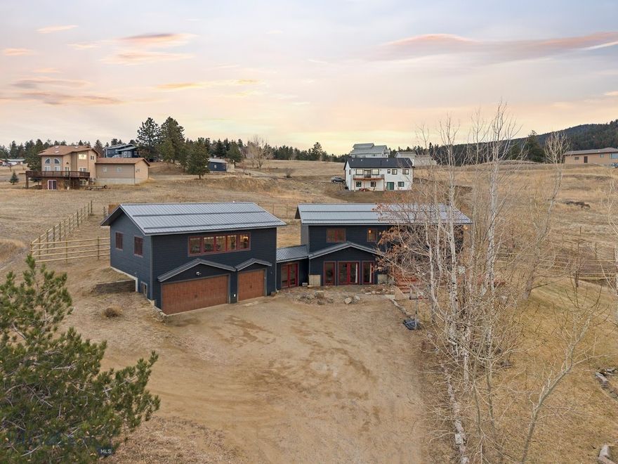 Elbow room and views! This home sits strategically on a 1.03 acre lot, allowing for stellar views of the mountains and city lights. All new trim, interior doors, light fixtures, bathtub, vanities and sinks. The sellers have also added a large, low maintenance rear deck for entertaining and 7' backyard fencing. Newer 3/4 inch oak floors in the main living area, tile flooring, concrete countertops, and a colorful Jortul wood burning stove in the basement for added comfort. This is the perfect property for multi-generational living or producing additional income. There is a brand new 1 bedroom apartment above the garage with a separate entrance for added convenience and privacy. The apartment has a beautiful kitchen, a separate water heater, heating/cooling system, and boasts oversized windows...talk about a room with a view! You can enter the guest quarters from the garage or it has its own separate entrance.