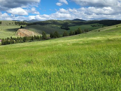 Photo of 65 Gold Coin Road, Hall, MT 59837 (MLS # 407208)