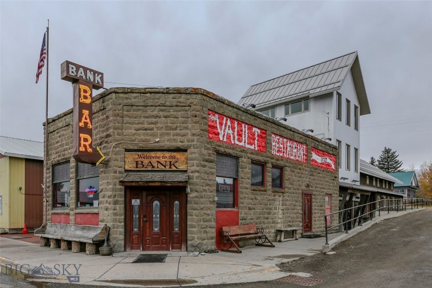 The Historic Bank Bar & Vault Restaurant! Featured on "America's Best Restaurants in 2024'  This Turn Key Business Opportunity includes Liquor, Catering and Gaming License. Originally established as a bank, this iconic building has been transformed into the popular bar that remains today. A beloved community gathering spot with a rich heritage. Built in the early 1900's, the Bank Bar has preserved its distinctive architectural features, including original brickwork, high ceilings and classic bank attributes that add to the character and charm. Over 5600 square feet of commercial space, consisting of  multiple levels including bar area, family dining space, kitchen and office space and much more. Situated in the heart of scenic Wilsall on the main highway, this property benefits from a central location that attracts both locals and tourists passing through this beautiful part of Montana! Whether you're interested in continuing the legacy of the popular Bank Bar or reimaging the space for your own business, this property is ready for your next venture!