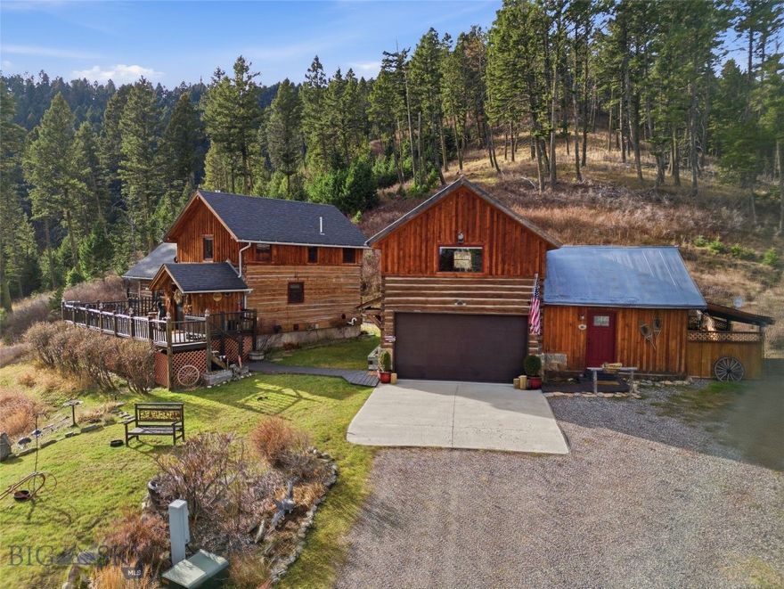 This beautiful, custom, hand hewn dovetail log home sourced from a homestead in the Snowy Mountains near Alder, MT, sits on 22.201 acres surrounded by woods, wildlife and mountains. The main home offers 2,376 sq. ft. of living space, encompassing 3 bedrooms, 3 bathrooms, and a 2-car garage. A cozy cottage feel is created throughout the home in the many details including the two gas fireplaces surrounded by moss rock hearths, a combination of slate and hardwood flooring, custom pine cabinetry, hammered copper sink, and exposed beams. The large master bedroom includes an en suite bathroom, walk-in closet, and opens to a patio which is perfect for enjoying your morning coffee or unwinding by the fire pit. Completing this property is a 700 sq. ft. detached 1-bedroom/1 bathroom ADU apartment with a proven track record as a successful vacation rental. Located just a short drive from both Bozeman and Livingston (about 15 minutes in either direction), the property is abundant in wildlife including moose, elk, deer and bear, and is bordered by two seasonal springs. The beautiful yard is set up with an underground sprinkler system and is filled with thoughtfully placed perennials. This property has housed horses in the past, complete with a loafing shed, water, and a fenced-in corral could easily be reinstalled. Enjoy the mountain views that complete this gorgeous and secluded setting. Schedule your showing today! By appointment only, please no drive-bys.